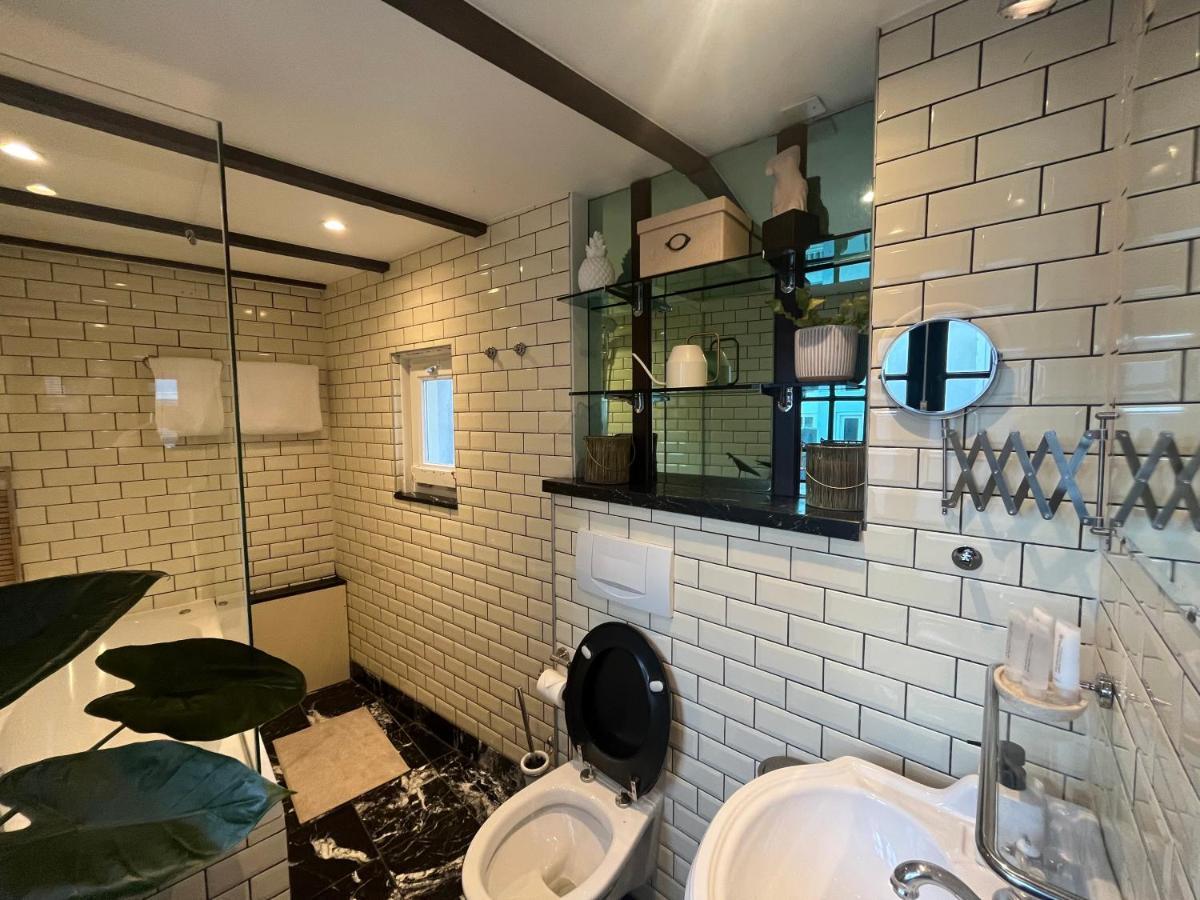 The Enlightened House Luxury Suites 阿姆斯特丹 外观 照片